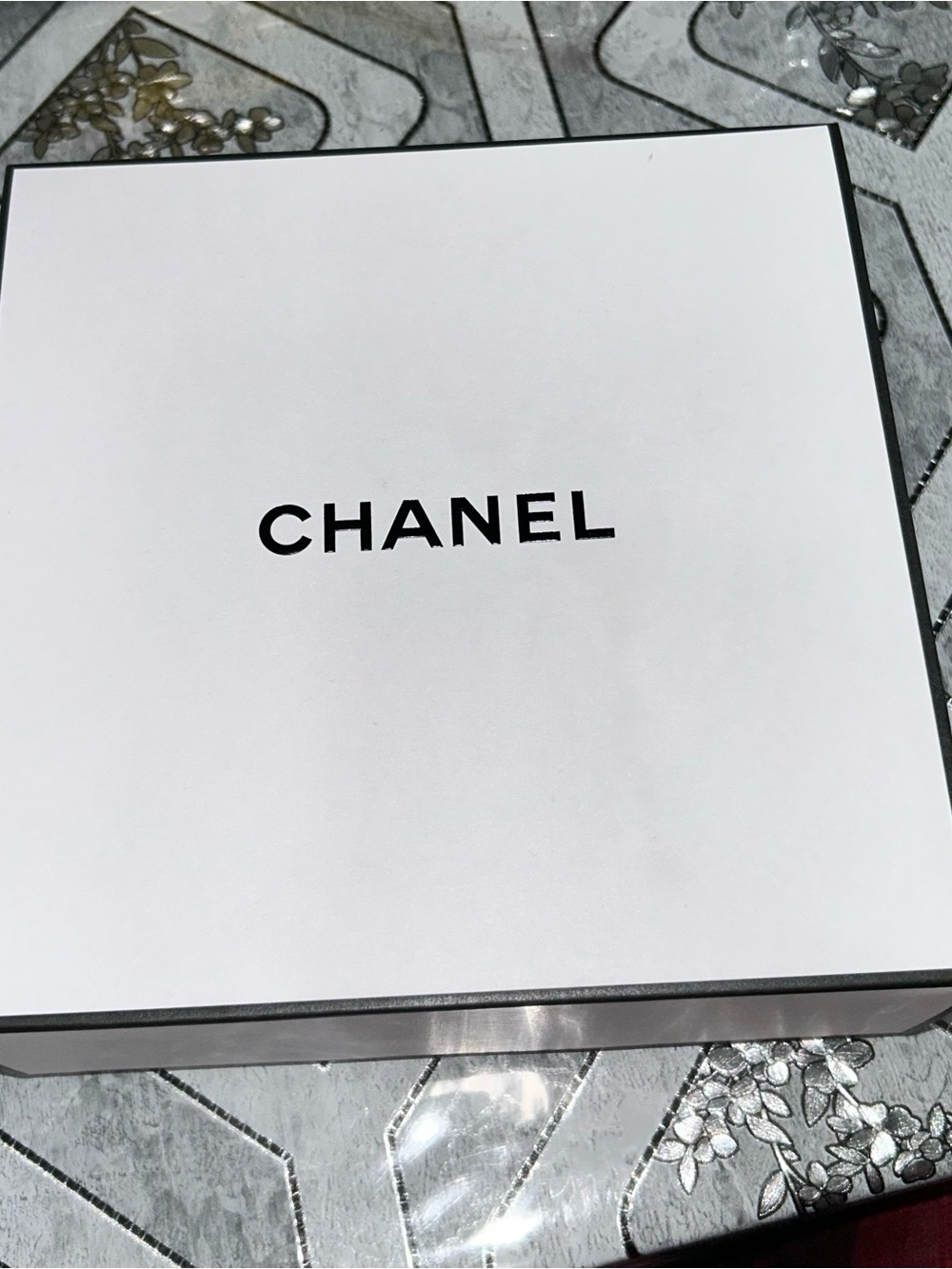 Chanel box on table